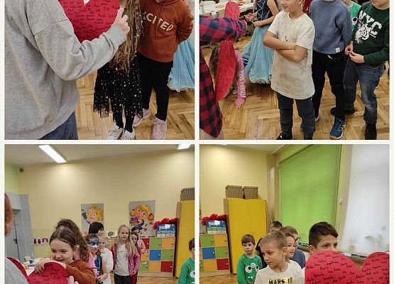 Uczniowie podczas wróżby z papierowym sercem