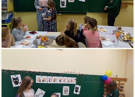 Uczniowie stoją przy tablicy