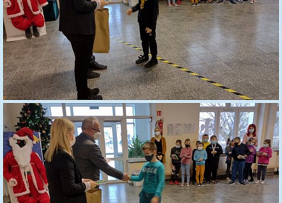 Uczniowie odbierają nagrodę