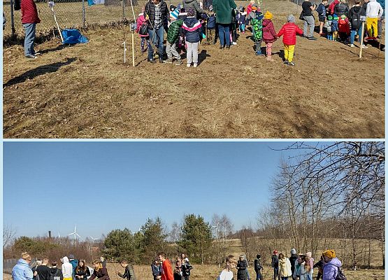 Uczniowie porządkują sad