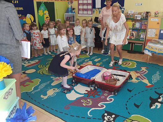 Grafika #35: ,,Bo wakacji nadszedł czas()"